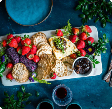 plate of fruits and biscuits